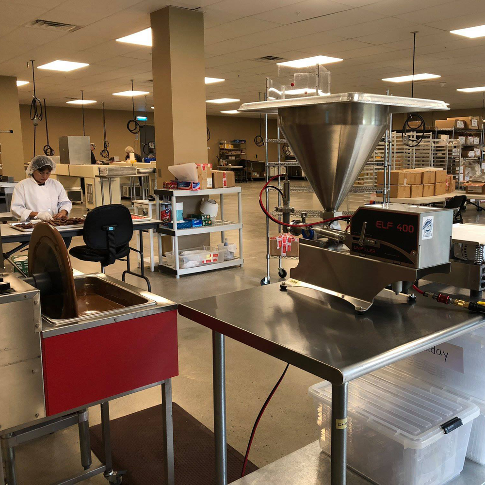 Production kitchen with chocolate tempering machines